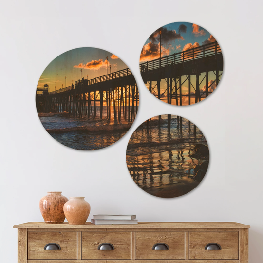 Designart 'Pacific Ocean Sunset Oceanside Pier' Modern Seascape Wood Wall Art Set of 3 Circles - Multi-Color