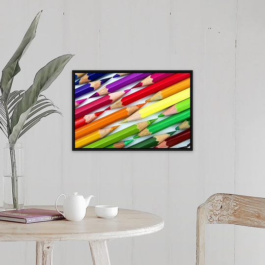 "Rainbow colored pencils arranged tip to tip." Black Float Frame Canvas Art
