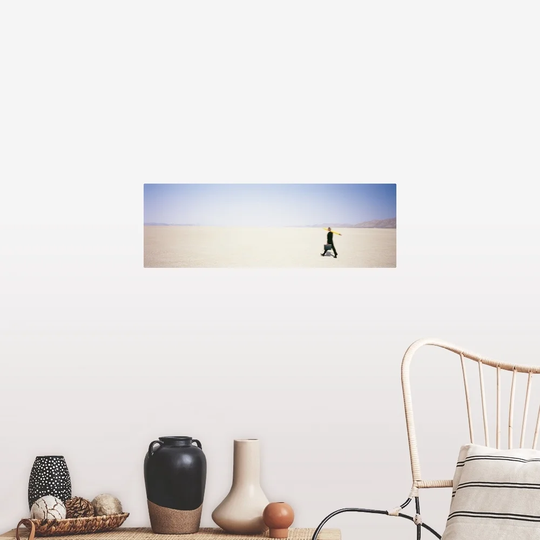 "Businessman walking in a desert with a large pencil and a briefcase, Black Rock Desert, Nevada" Poster Print - Multi