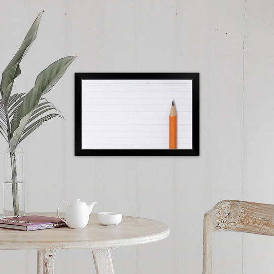 "Pencil on blank sheet of paper" Black Framed Print