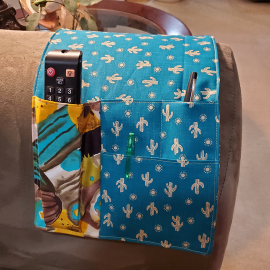 Sofa Or Chair Arm Caddy For Remote Control & Other Items Including A Book Sleeve