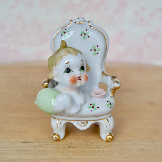 Vintage Baby On Chair Ceramic Figurine With Painted Flowers