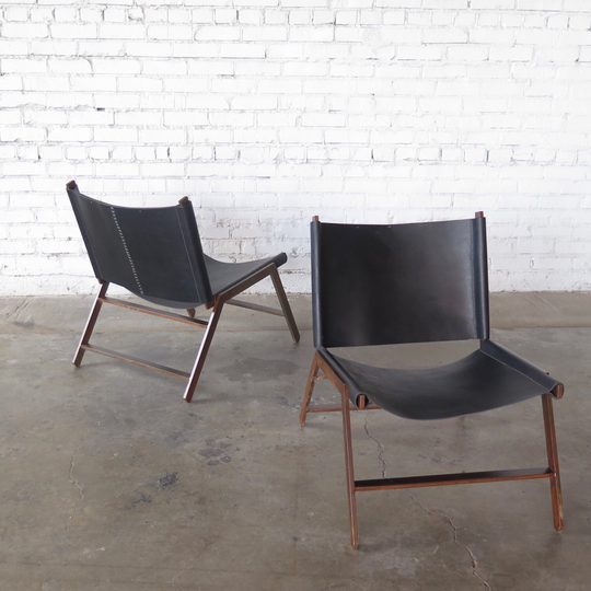 Black Leather Slung Chair With Antiqued Brown Patina Finish Legs