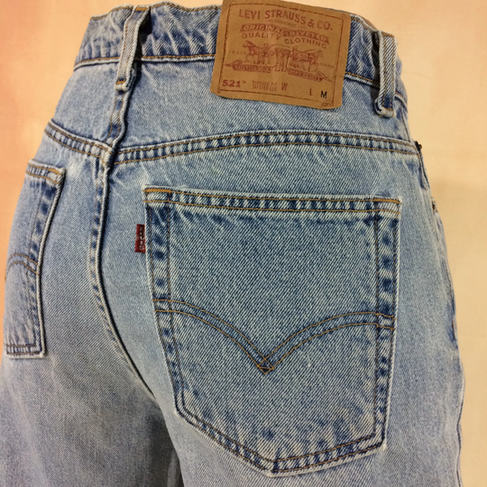 Size 28 Vintage Levis 521 Distressed Light Wash Women's Jeans High Waisted Tapered Fit Leg 90's Classic Mom Made in Usa