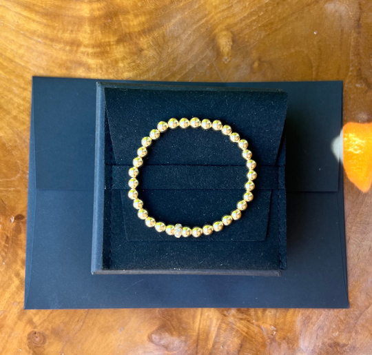 14K Gold Twisted Diamond Roundel Beaded Bracelet - Stretched